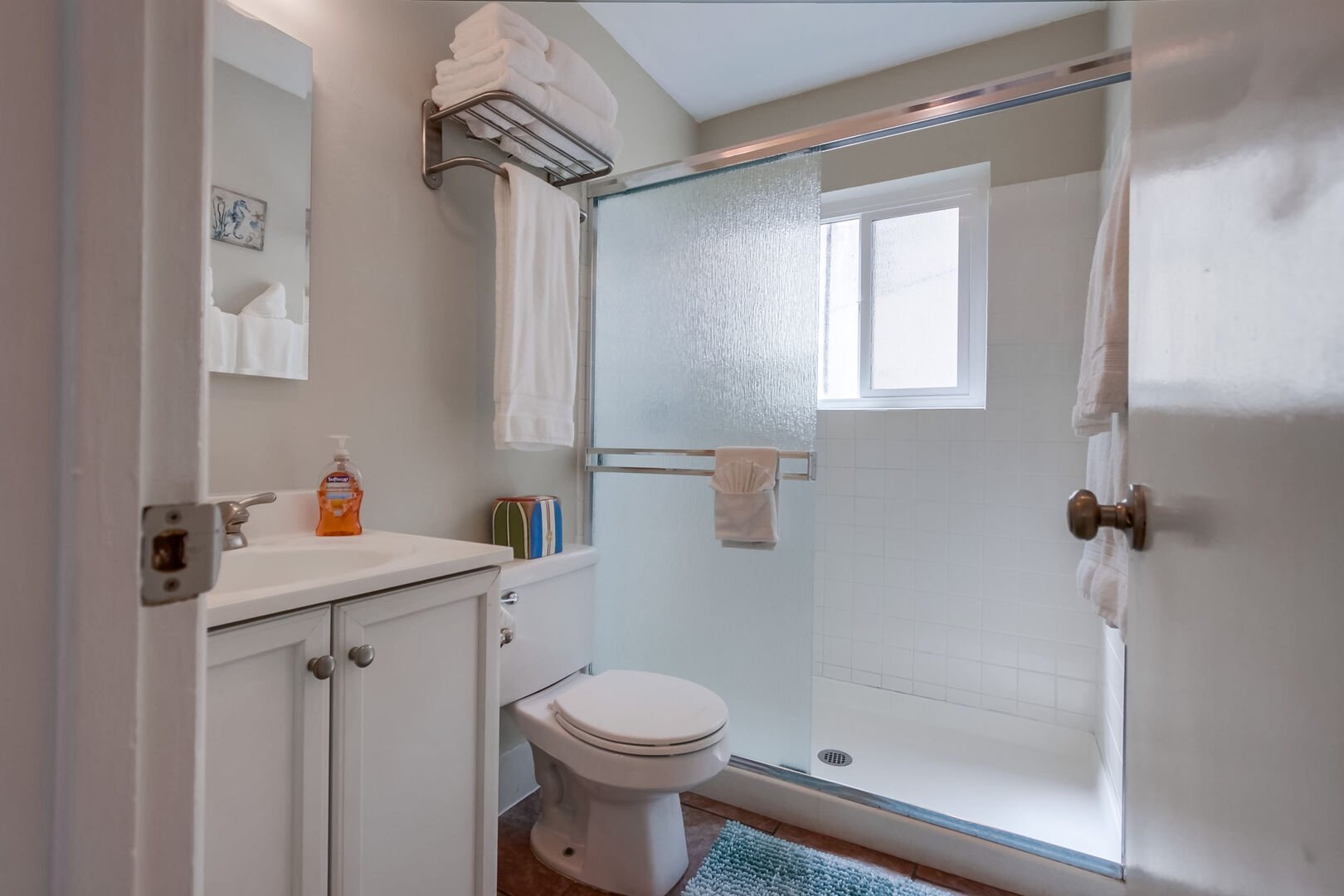 Shared bathroom with walk-in shower