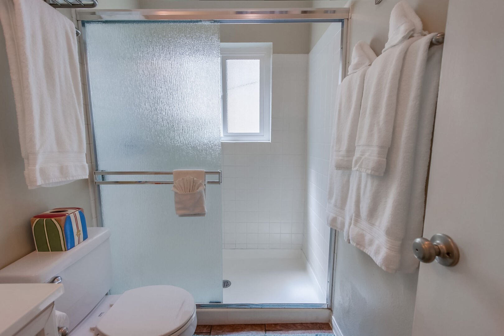 Shared bathroom with walk-in shower