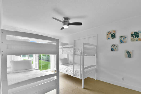Bedroom 3 
2 bunk beds providing 4 twin beds
Ceiling Fan
Storage
Patio doors to pool area