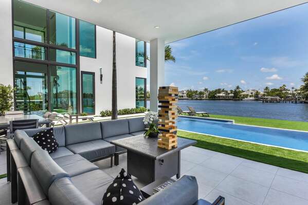 Outside seating area overlooking the pool and intracoastal