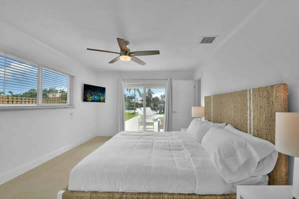 Bedroom 1 
King bed, Quality fresh linen and towels provided
En-suite 
Desk 
Ceiling fan and patio doors