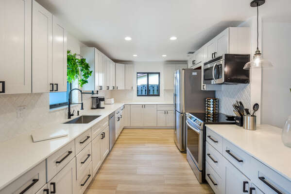 Modern kitchen is immaculately clean for your arrival
