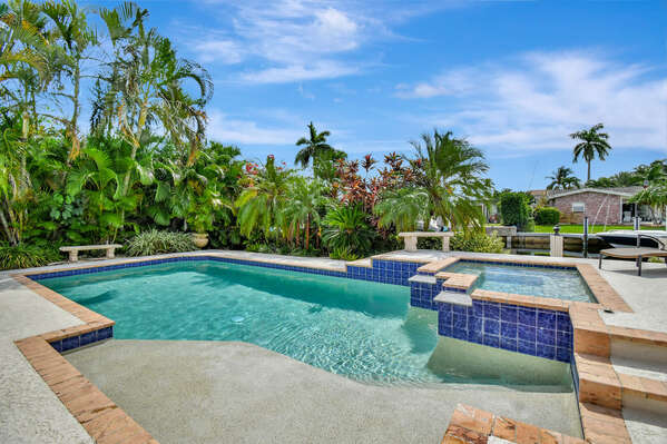 Tropical planting surrounds the Yard and Pool area, offering seclusion and vibrant visuals