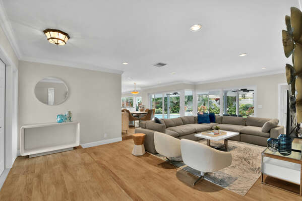 Open plan interior, large family sofa in lounge area