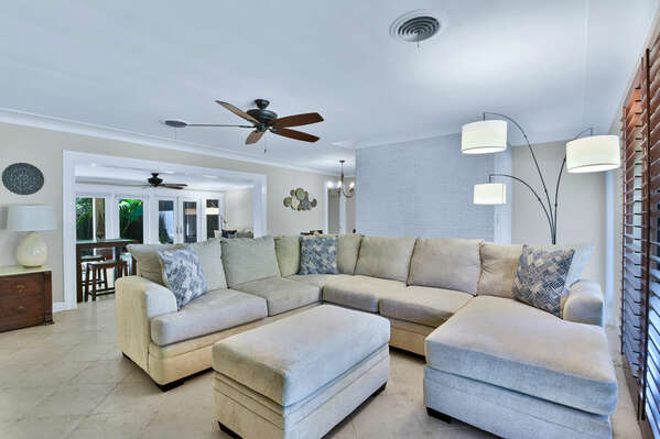 Large, comfortable sofa in the lounge area is a perfect place to unwind