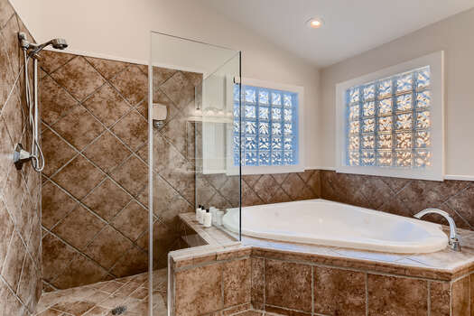 Main House Master Bath with a Jetted Tub and Separate Shower