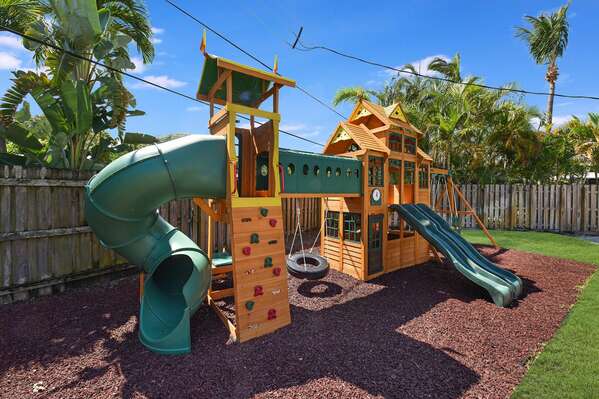 Swing Set in the yard with soft flooring suitable for children's play