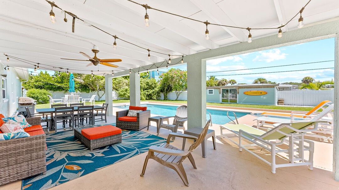 Escape to a huge private yard with a heated pool, hot tub, and outdoor living space—perfect for relaxation and entertainment.