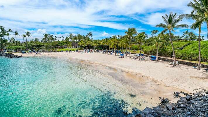 Chairs, cabanas, sheltered waters for snorkeling and paddle-boarding, as well as the Napua Restaurant and Bar.