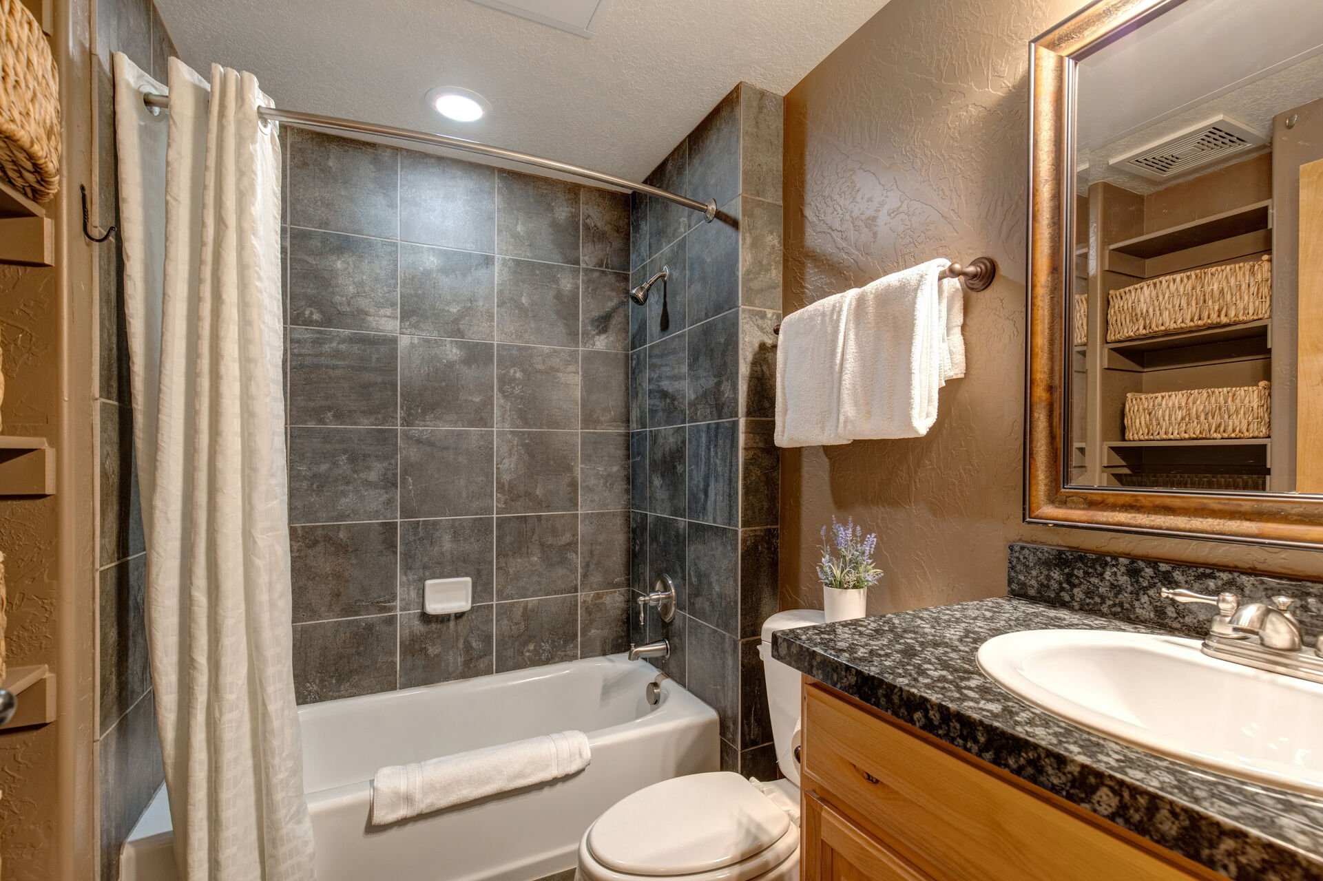 Shared Full Bathroom with tub/shower combo