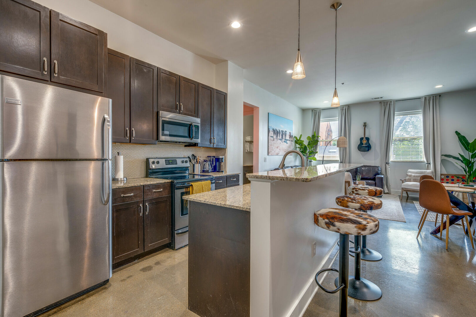 Fully stocked kitchen with your basic cooking essentials and complete with stainless steel appliances.