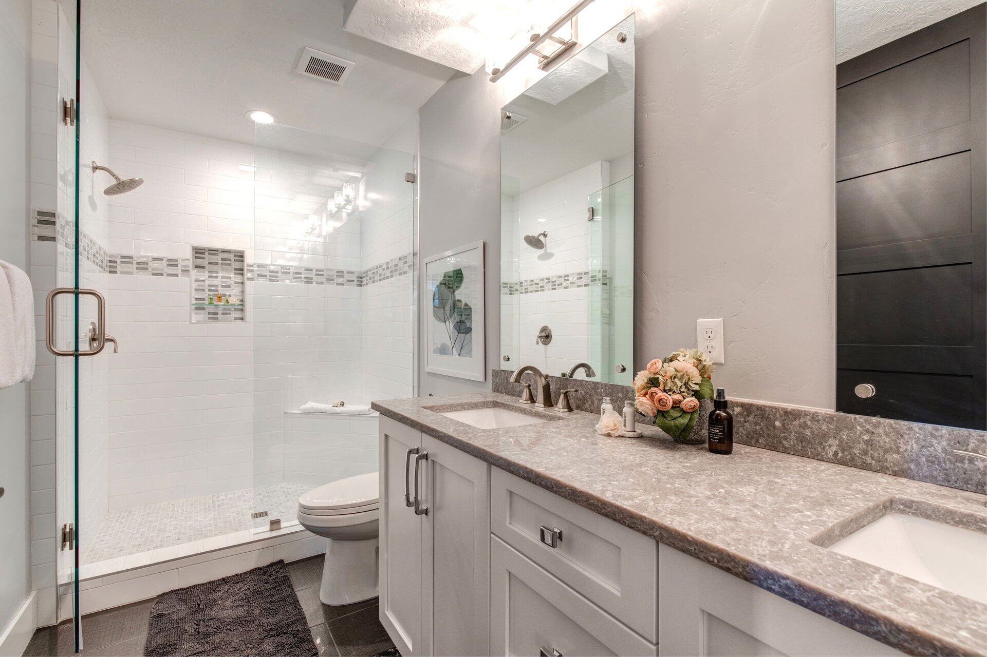 Lower Level Shared Bath with double sinks and shower