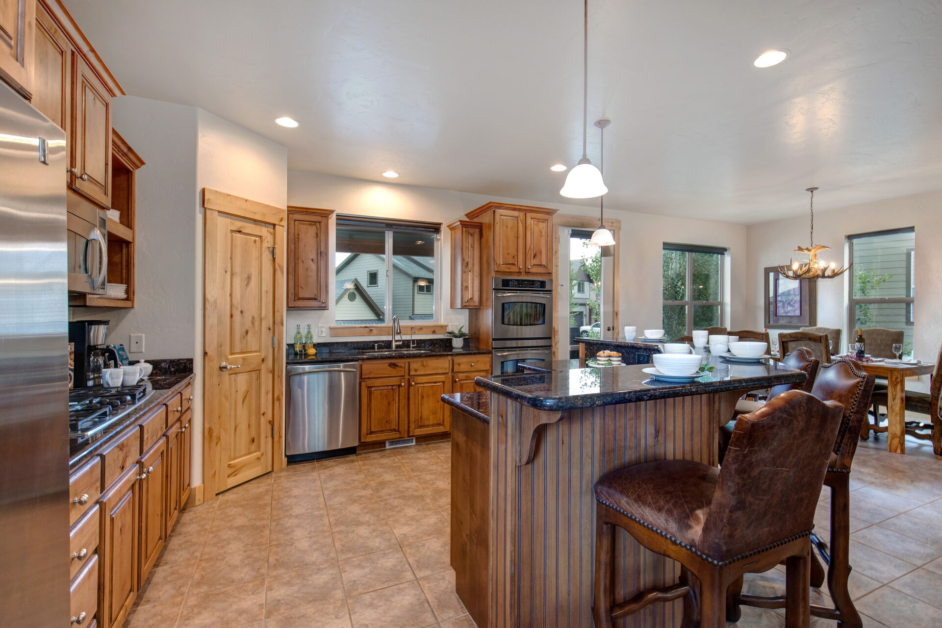 Spacious Kitchen with a Center Island and Deck Access