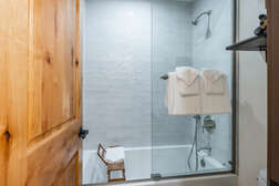 Shared Full Bathroom in Downstairs Hallway  / Outside of Bedroom #2 / Shower and Tub