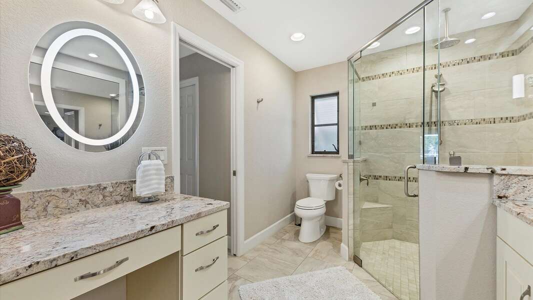 Spacious and bright master bathroom with walkin shower