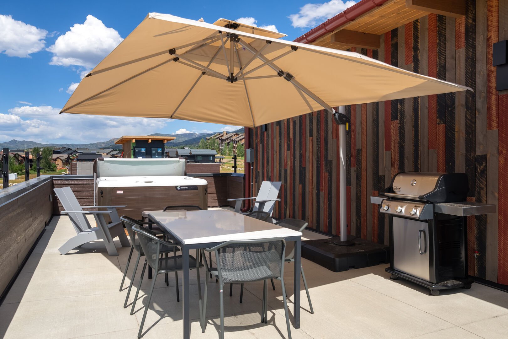 Rooftop Retreat! Complete with rooftop hot tub, shaded dining, fire pit, pet friendly, this property has it all!!