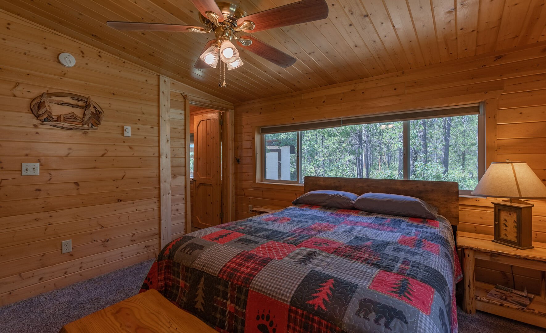 Hooter Hollow ~ bedroom #1 on main level w/ queen bed and ensuite full bathroom