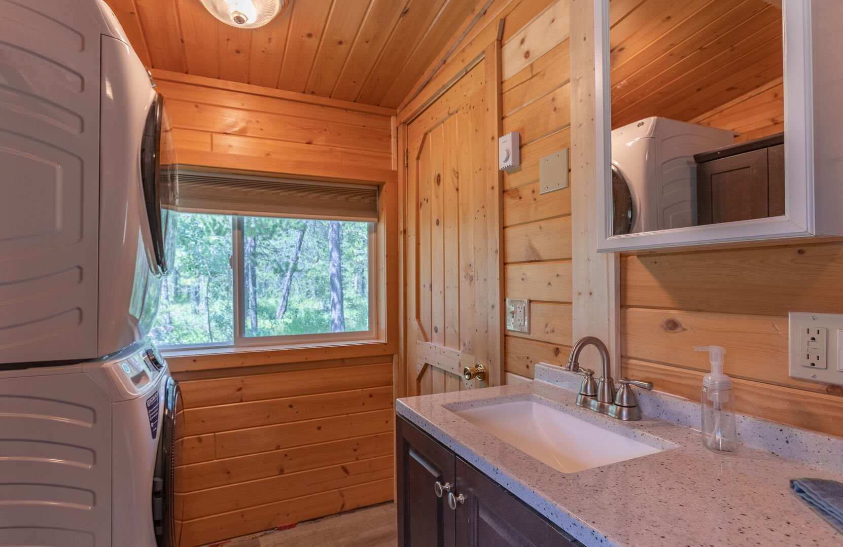 Hooter Hollow ~ bedroom #1 on main level w/ queen bed and ensuite full bathroom