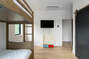 Air conditioner unit in the ceiling of the 3 upper level bedrooms and the living space.