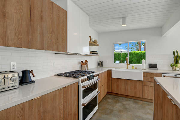 CHEF'S KITCHEN!  AND PLENTY OF COUNTER TOP SPACE WITH STATE OF THE ART APPLIANCES!  AND COFFEE BAR STOCKED!