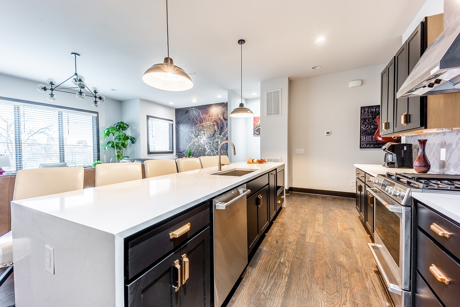 1st unit: Gourmet style kitchen fully stocked with your basic cooking essentials. Includes stainless steel appliances and breakfast bar seating.
