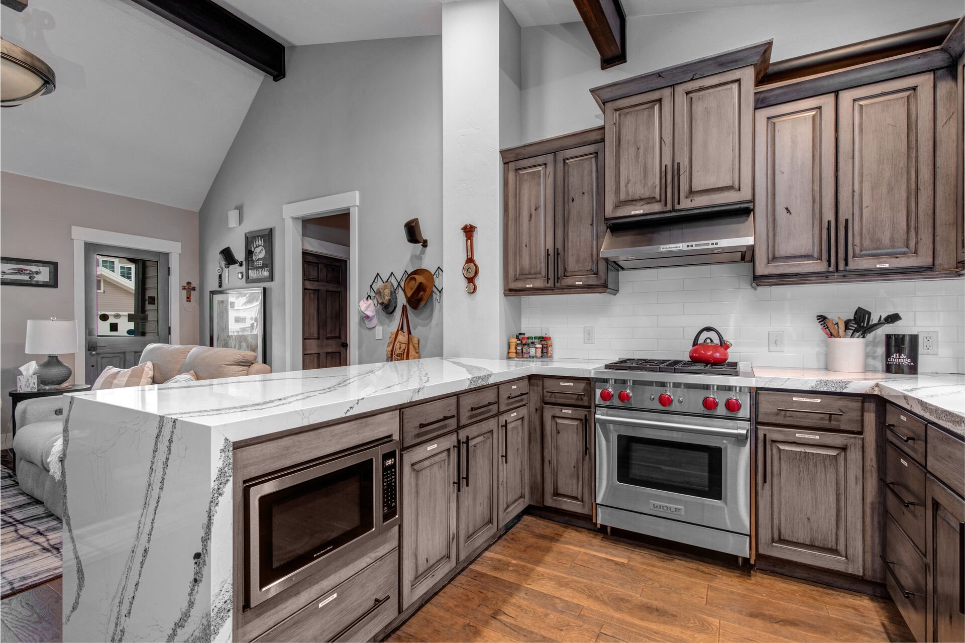 Updated Kitchen with Stainless Appliances Including a Wolf Gas Range