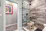 Master Bath with a Tile / Glass Shower
