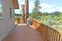 A side deck that leads to the back deck