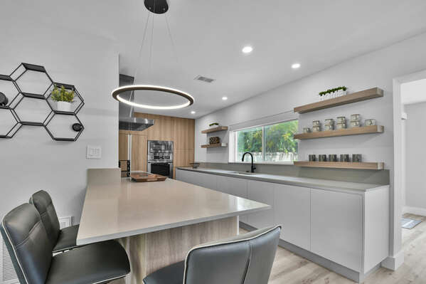 Kitchen and dining area provide ample space for hungry mouths