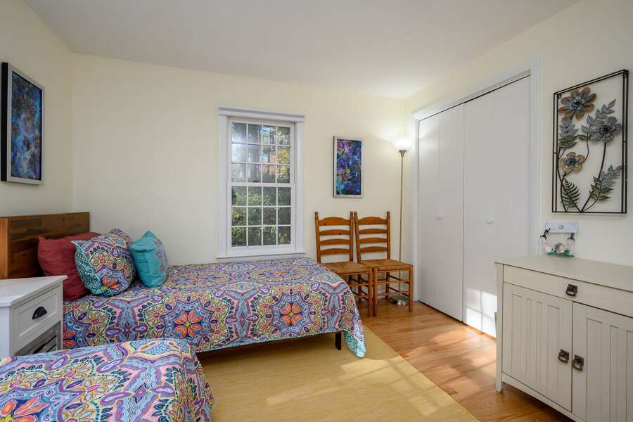 Twin bedroom with pops of color and lots of natural light - 1325 Bridge Road Eastham Cape Cod - Turtle Dreams - NEVR