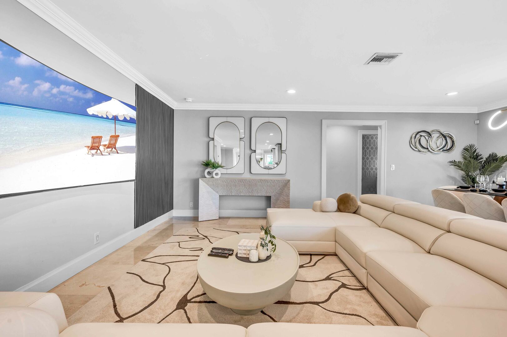 In the living area you will find an enormous wrap around couch and flat screen TV; perfect for late night movies and weekend sports entertainment.