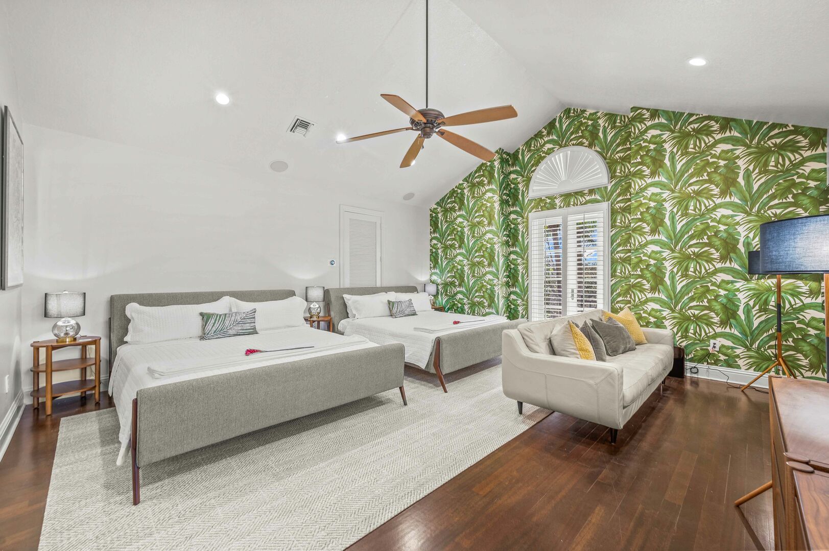 The fifth bedroom is privately placed above the garage space and large enough for an entire family or group of teens. The bedroom includes 2 king beds.
