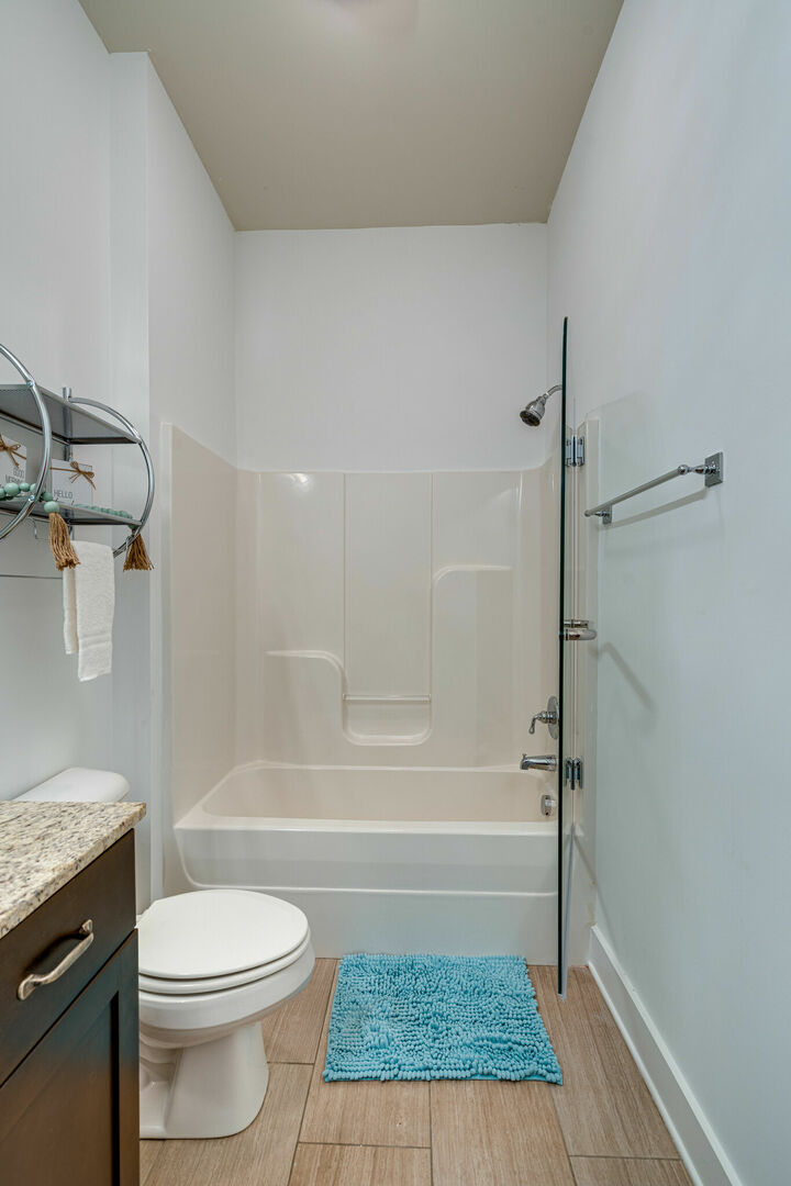 Primary Bathroom featuring a single vanity with a shower/tub combo.