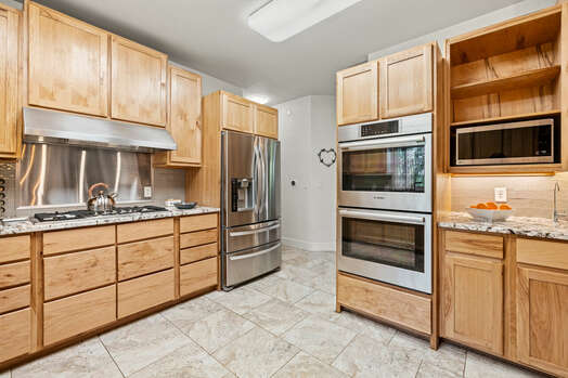 Stainless Appliances Including Gas Stovetop and Double Ovens