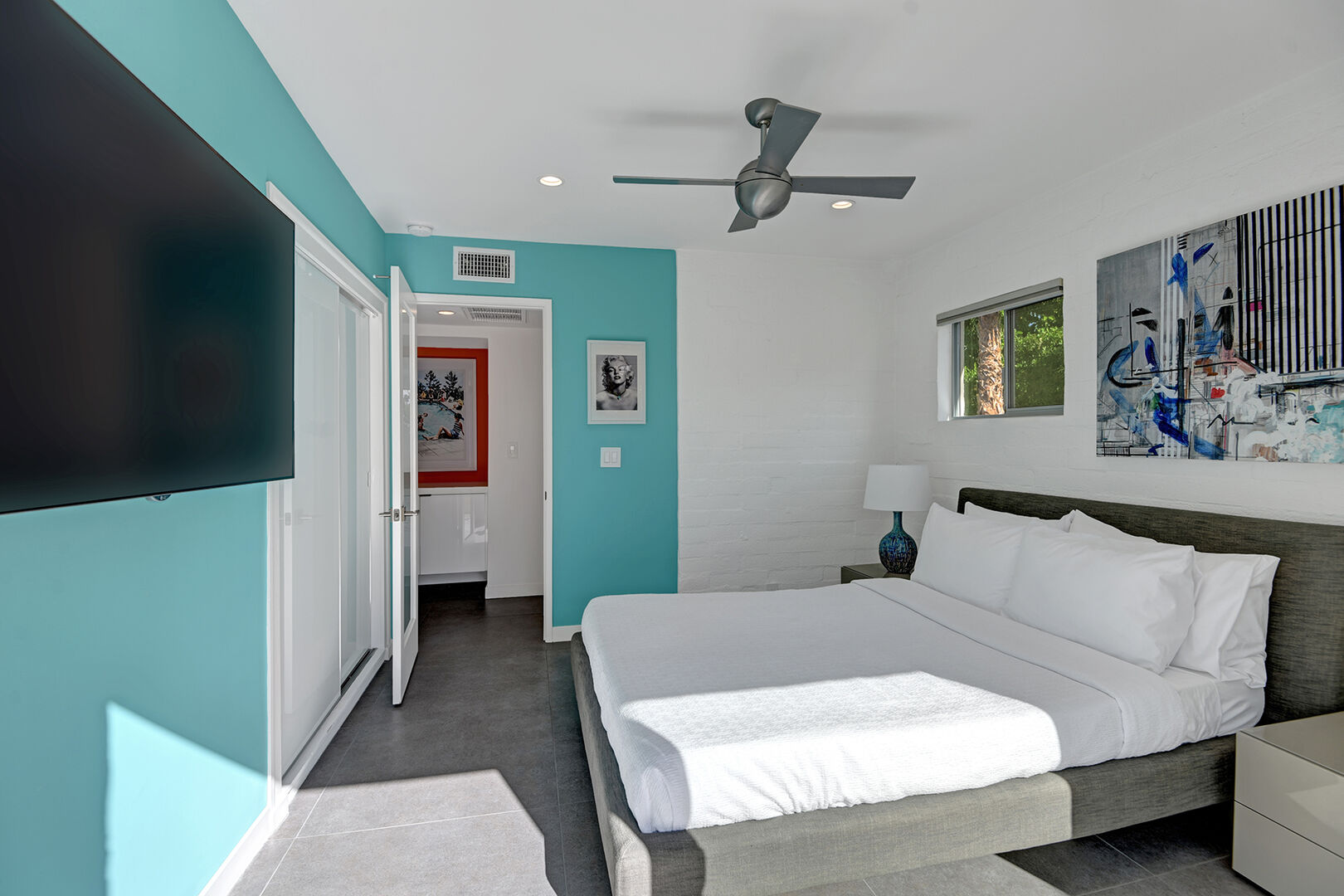 BEDROOM #3 WITH ACESS TO OUTDOOR SPACE, CELING FAN, AND SMART TV