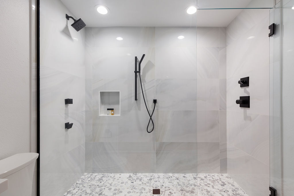 Large stand in shower.