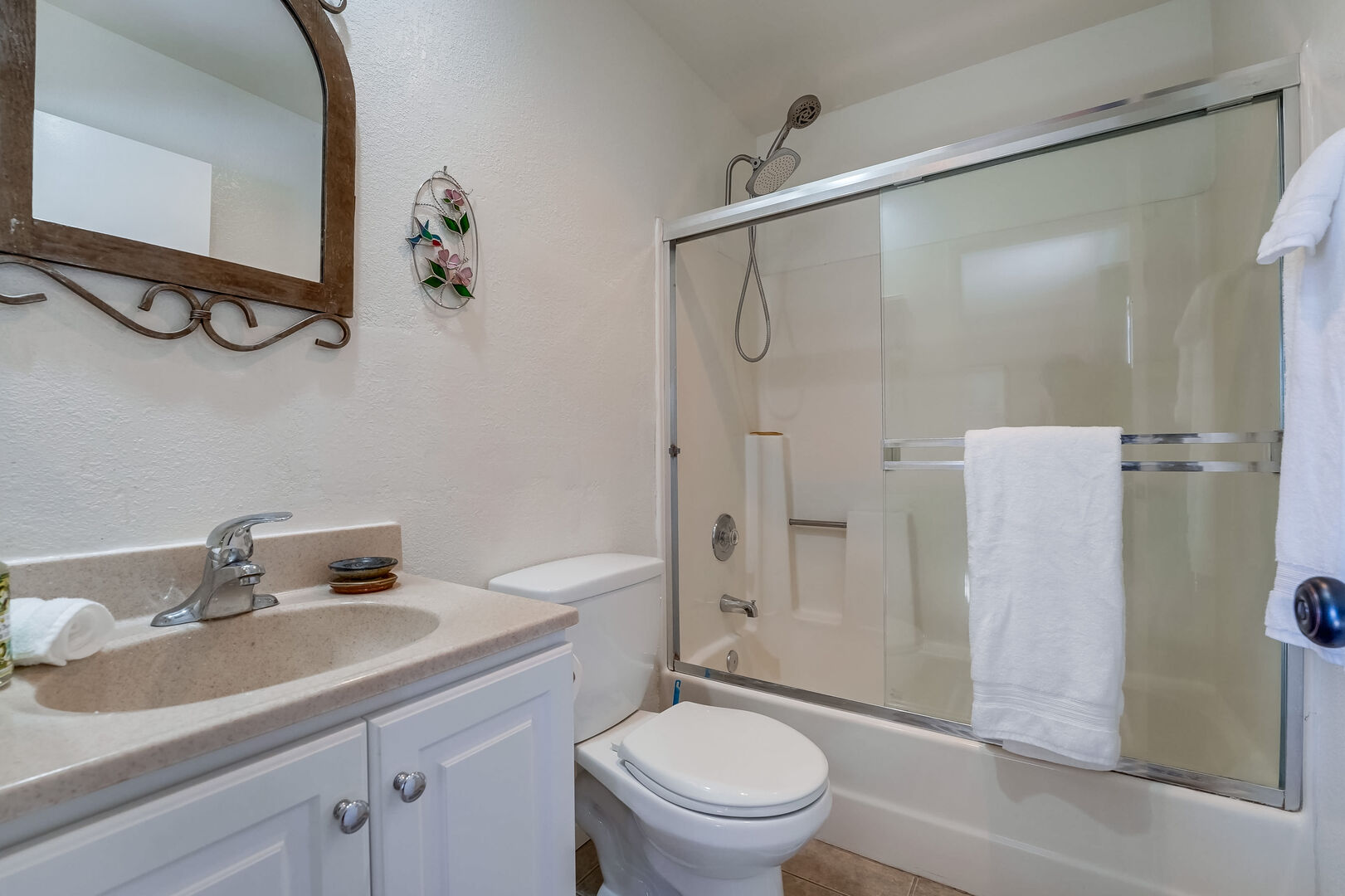 Master bathroom with shower-tub combo