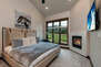 Master Bedroom with a King Bed and Gas Fireplace