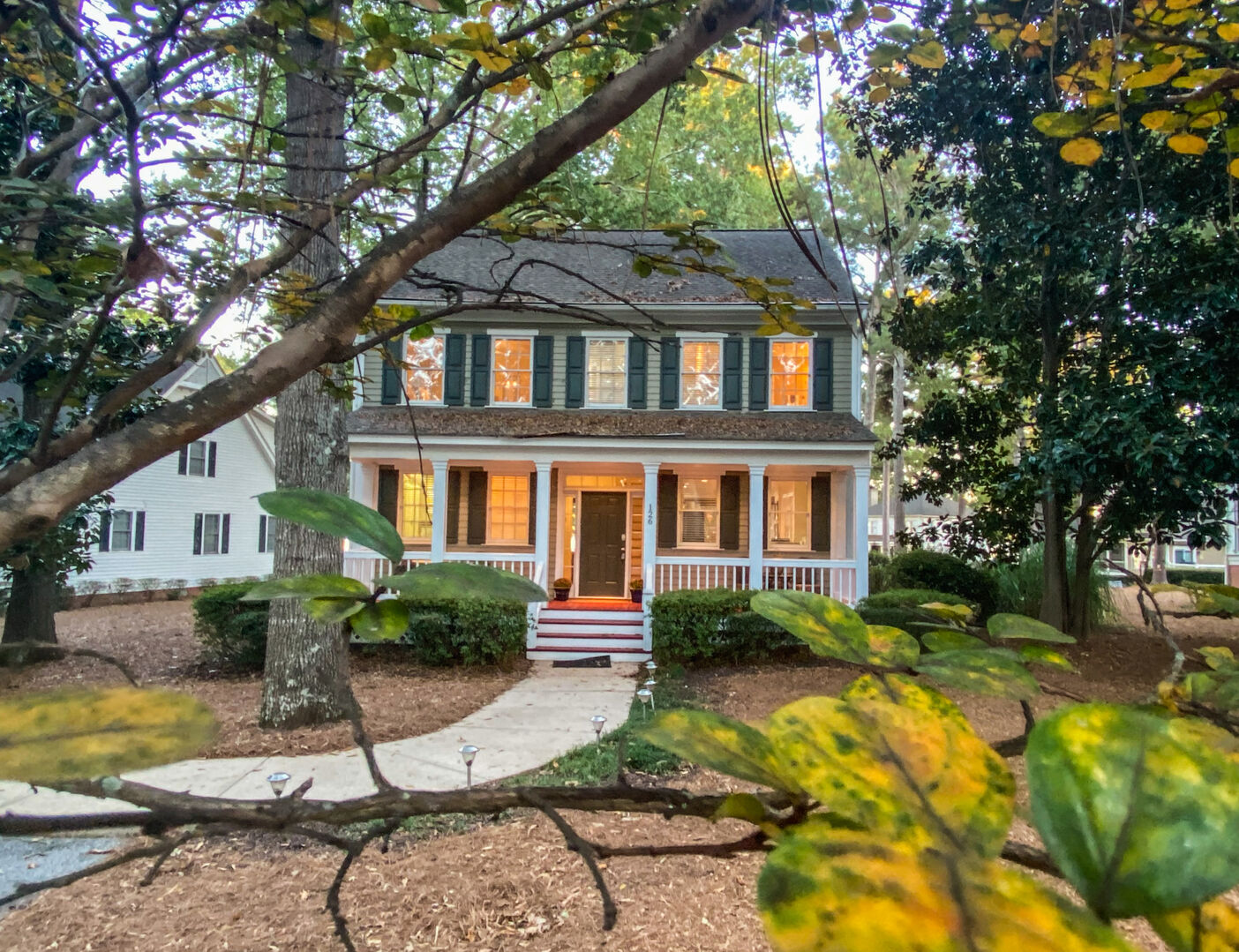front of house views Great Waters golf course/clubhouse and backside unobstructed views of lake and boat docks