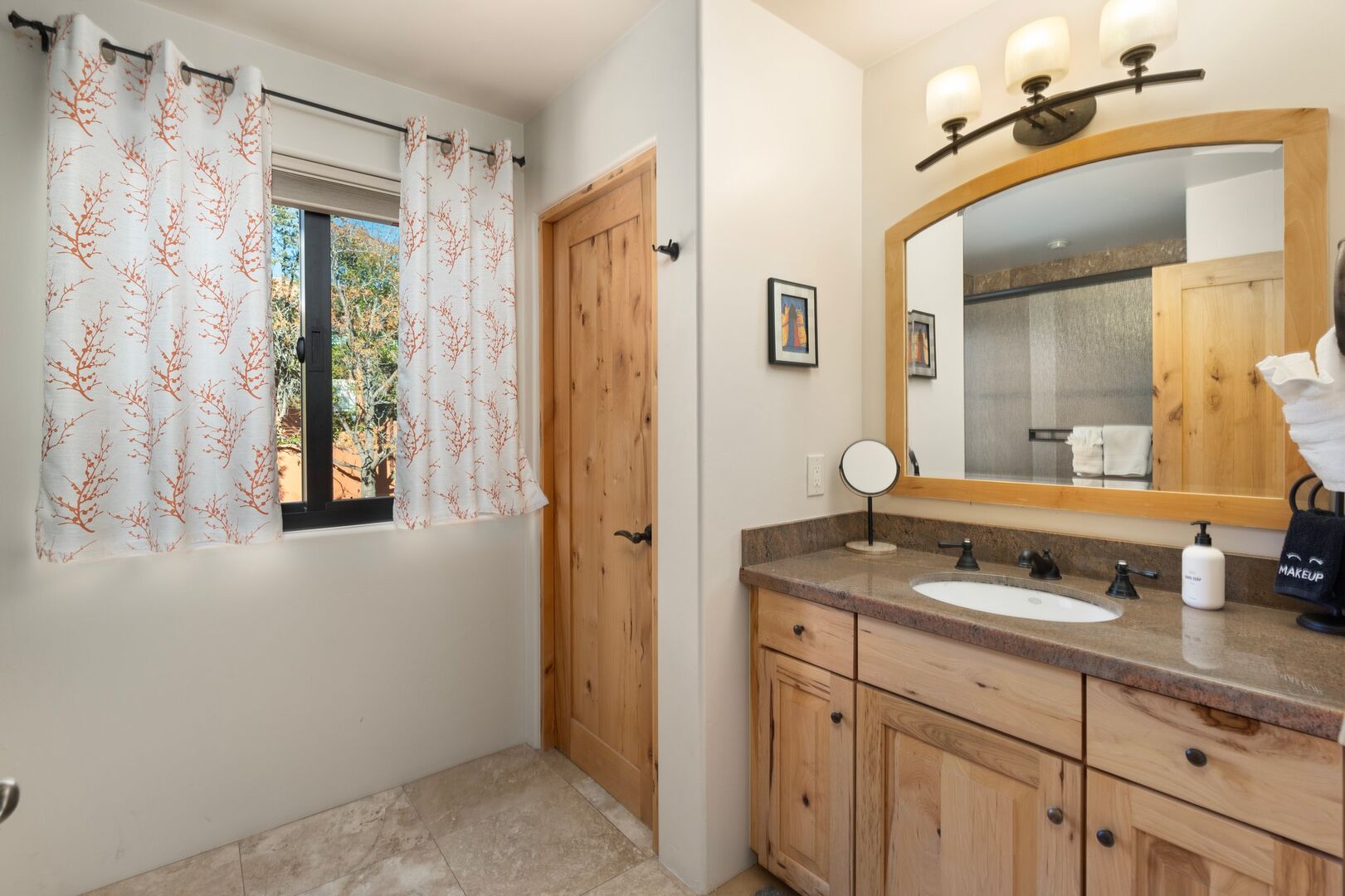 Hall Bathroom:
The hall bathroom features tub/shower combo, a single vanity, and modern fixtures.