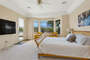 Master bedroom with 65
