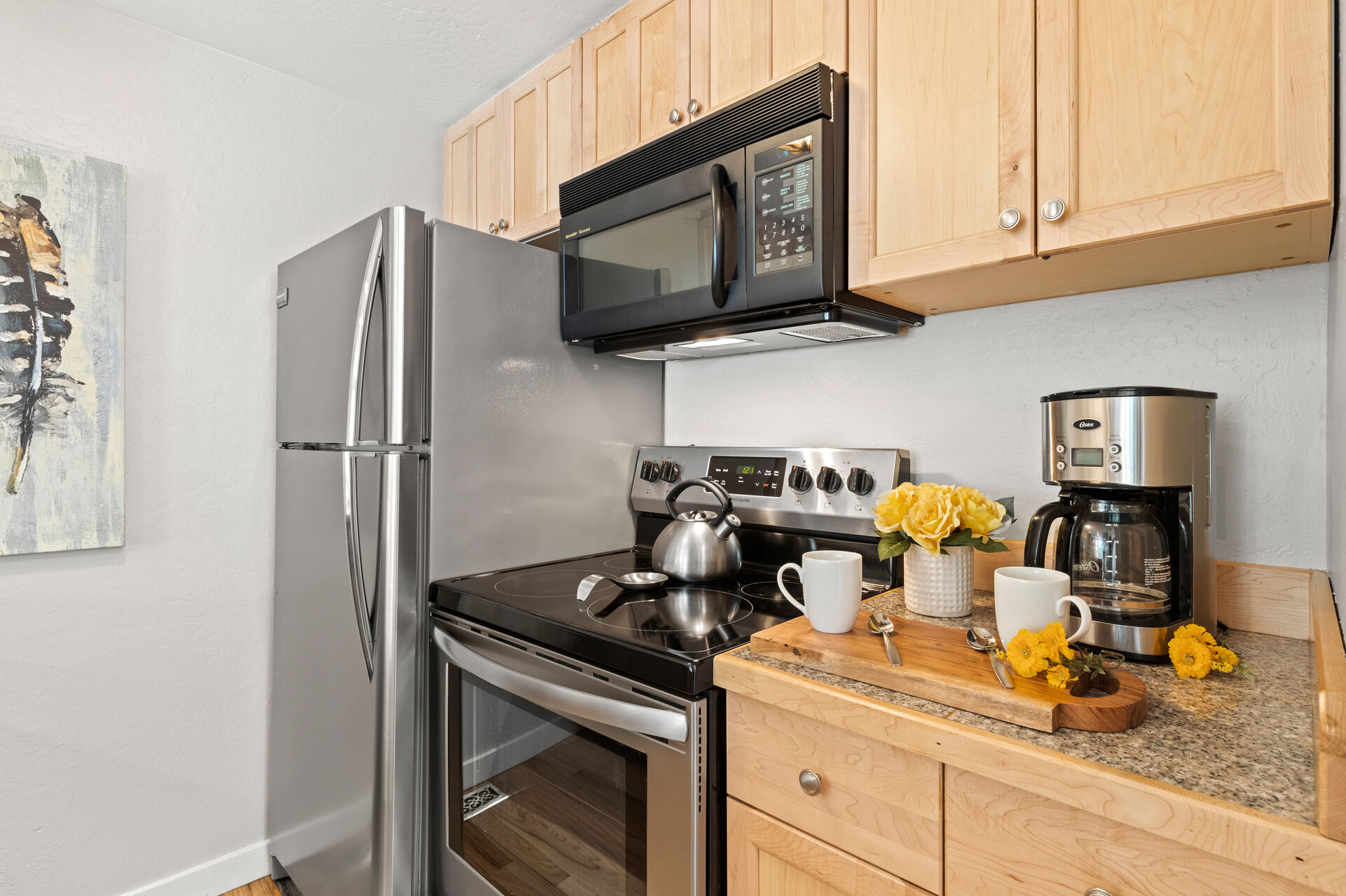 Fully Equipped Kitchen with stainless steel appliances and ample counter space
