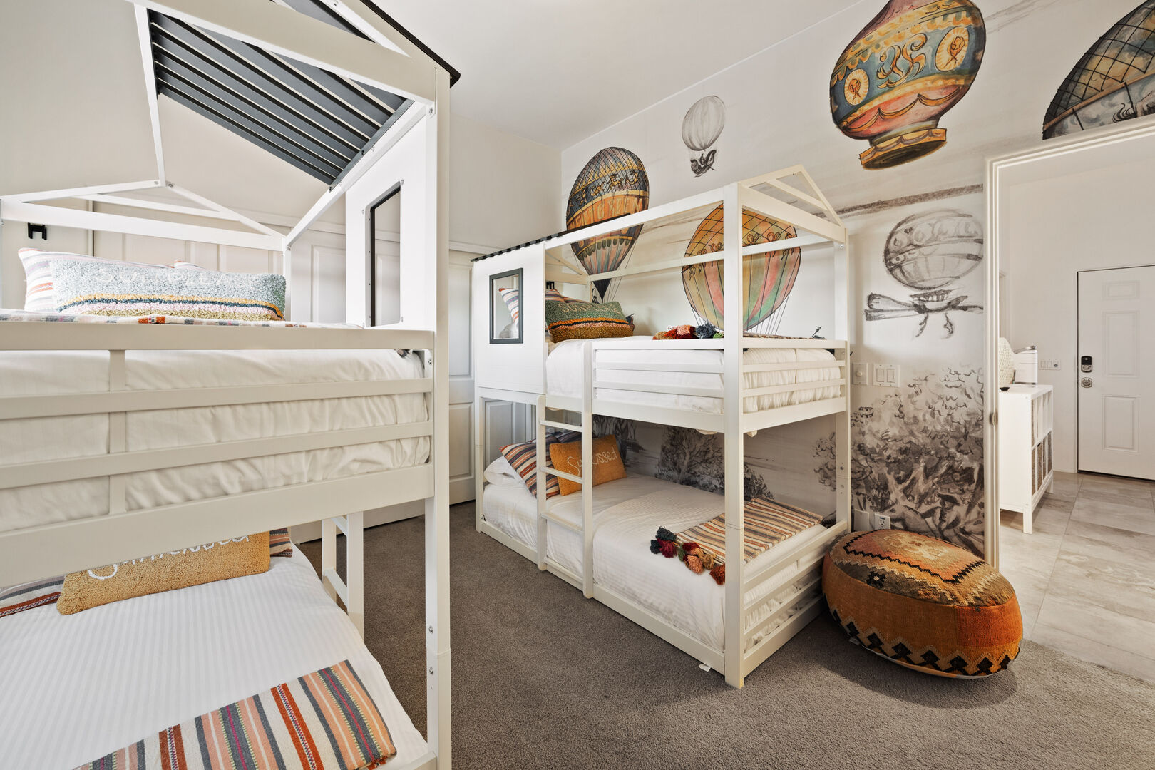 Fly off to dream land in this darling kids bunk room.