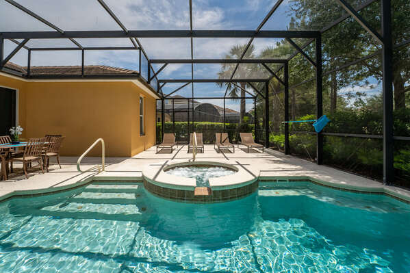 Pool and spa showing sun loungers and privacy