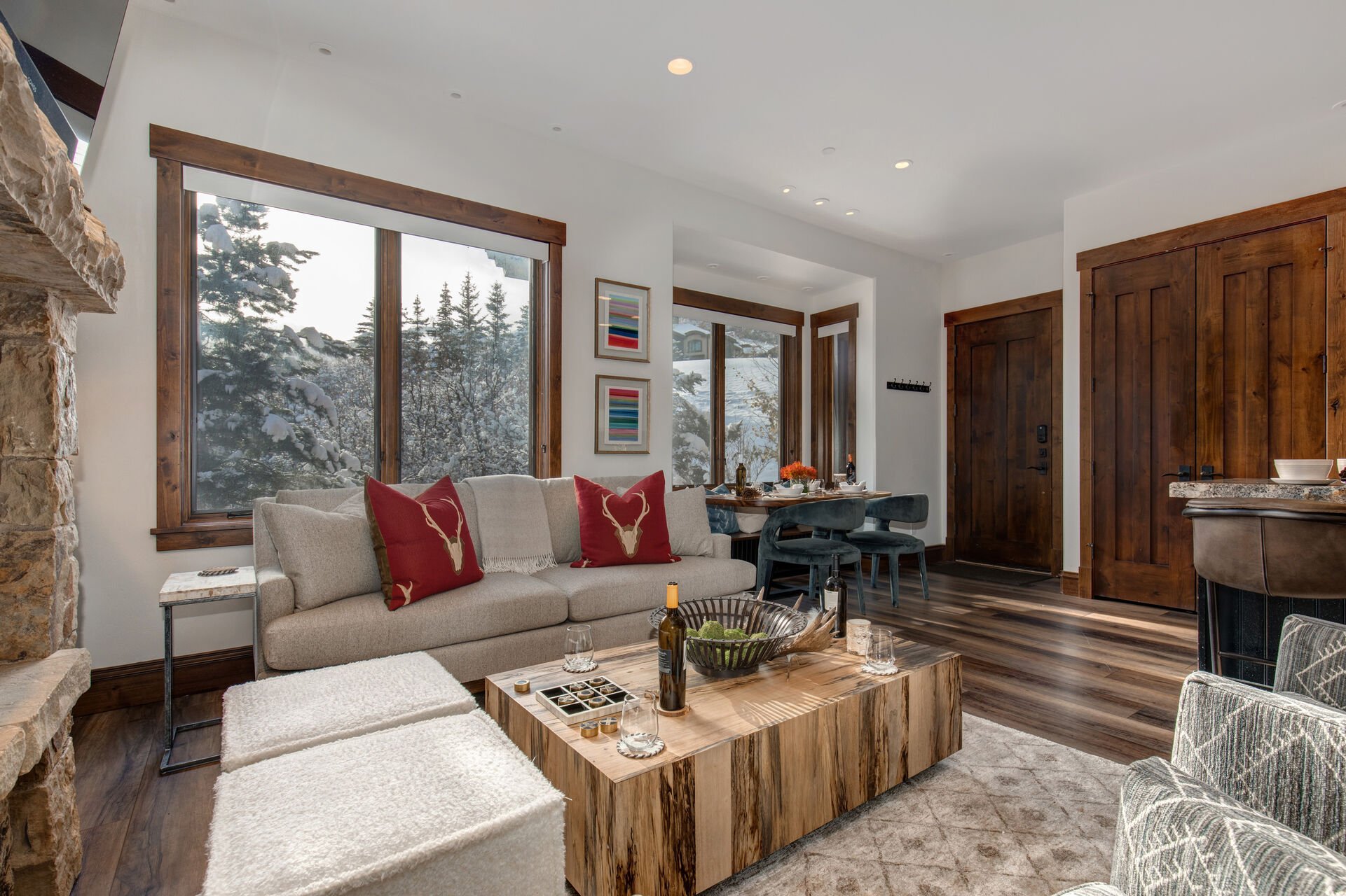 Mountain contemporary furnishings, a 65” Smart TV with cable programming and Sonos Soundbar, a cozy gas fireplace and a plethora a of natural light