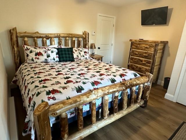 3rd Floor Bedroom with King Size Aspen Log Bed and Rustic Furniture