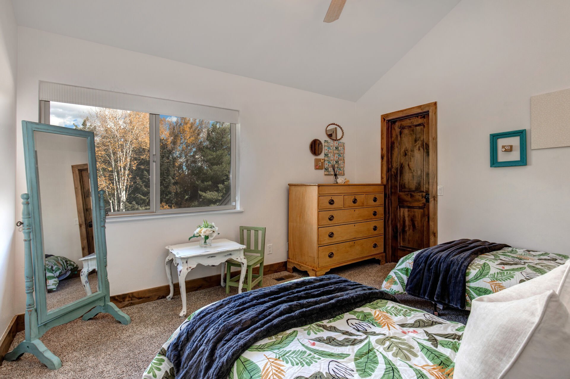 Bedroom 3 with two twin beds and shared bath access