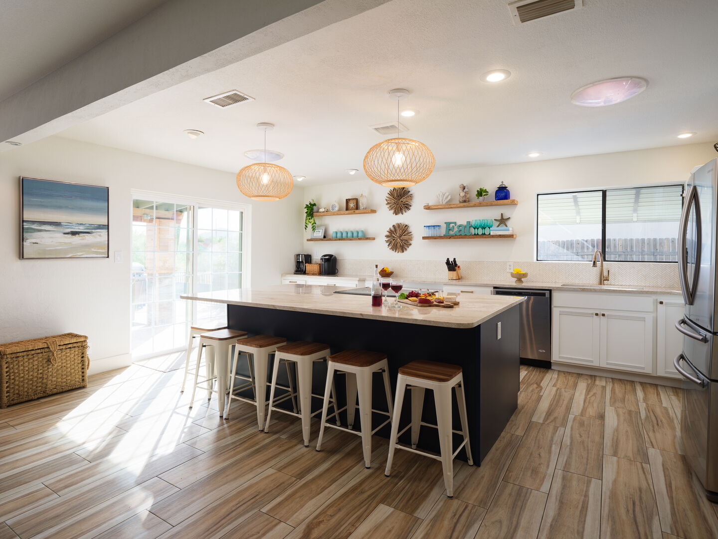 Gorgeous and bright farm-style kitchen. Fully equipped with your basic cooking essentials. Features stainless steel appliances, and breakfast bar seating.