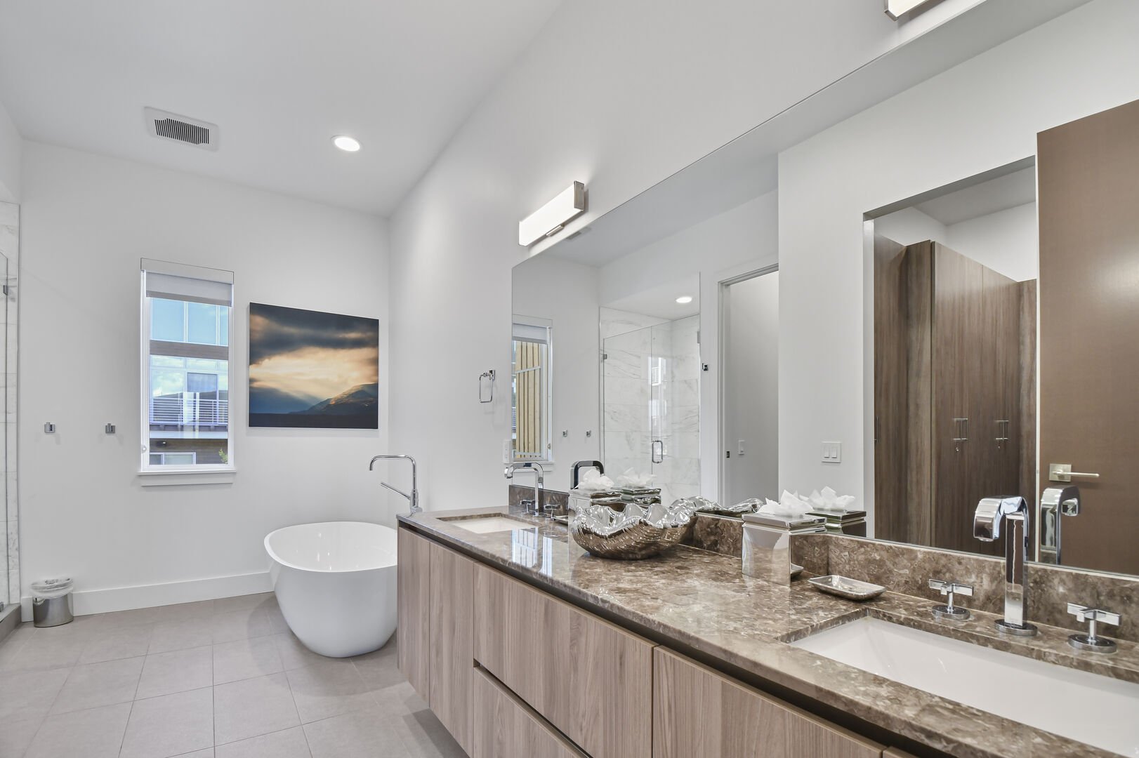 master bath is ensuite with double vanity and deed soaking tub
