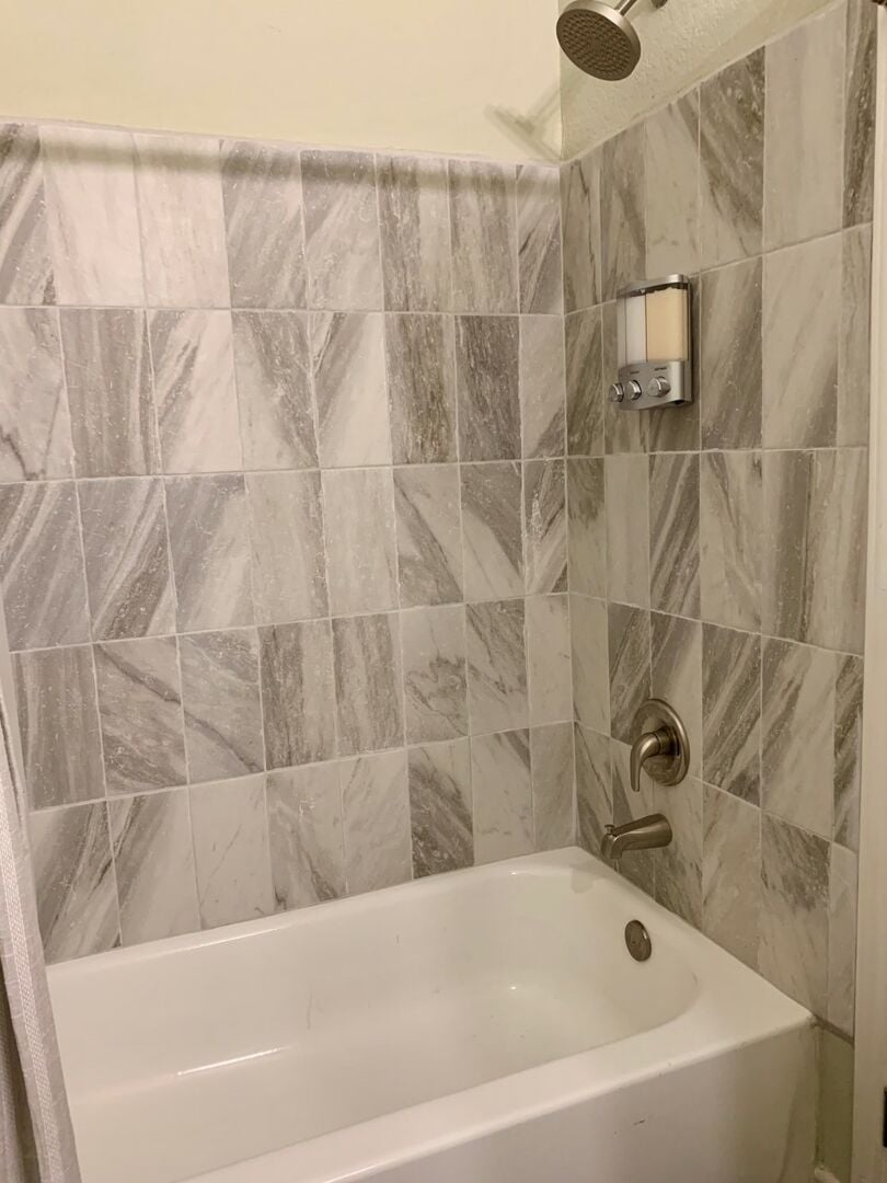 Master tub/shower combo with tile surround